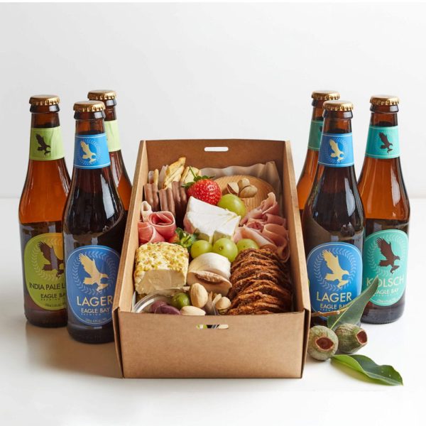 The Laze and Graze Grazing Box and Beer contains: 6 assorted bottles of Eagle Bay beer, Assorted fruit, Olives, Sweet biscuits, Assorted meats, nuts, Soft cheeses, Crackers and Dip