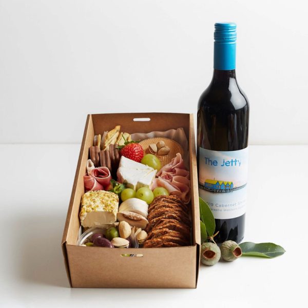 The Laze and Graze Grazing Box and Shiraz contains: 1 bottle Shiraz wine from Whicher Ridge Wines, Assorted fruit, Olives, Sweet biscuits, Assorted meats, nuts, Soft cheeses, Crackers and Dip