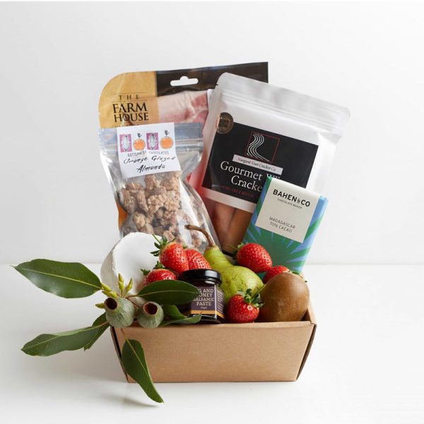 The Soak and Snack Hamper contains: Margaret River Camembert Cheese, Margaret River Gourmet Crackers, Vasse Virgin Fig and Balsamic Paste, Artisan St Orange Glazed Almonds, Bahen & Co. Chocolate Block, Antipasto Meat Selection and Seasonal fruit