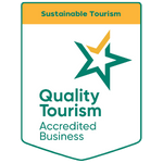 An image showing Tree Chalets Quality Tourism Accreditation